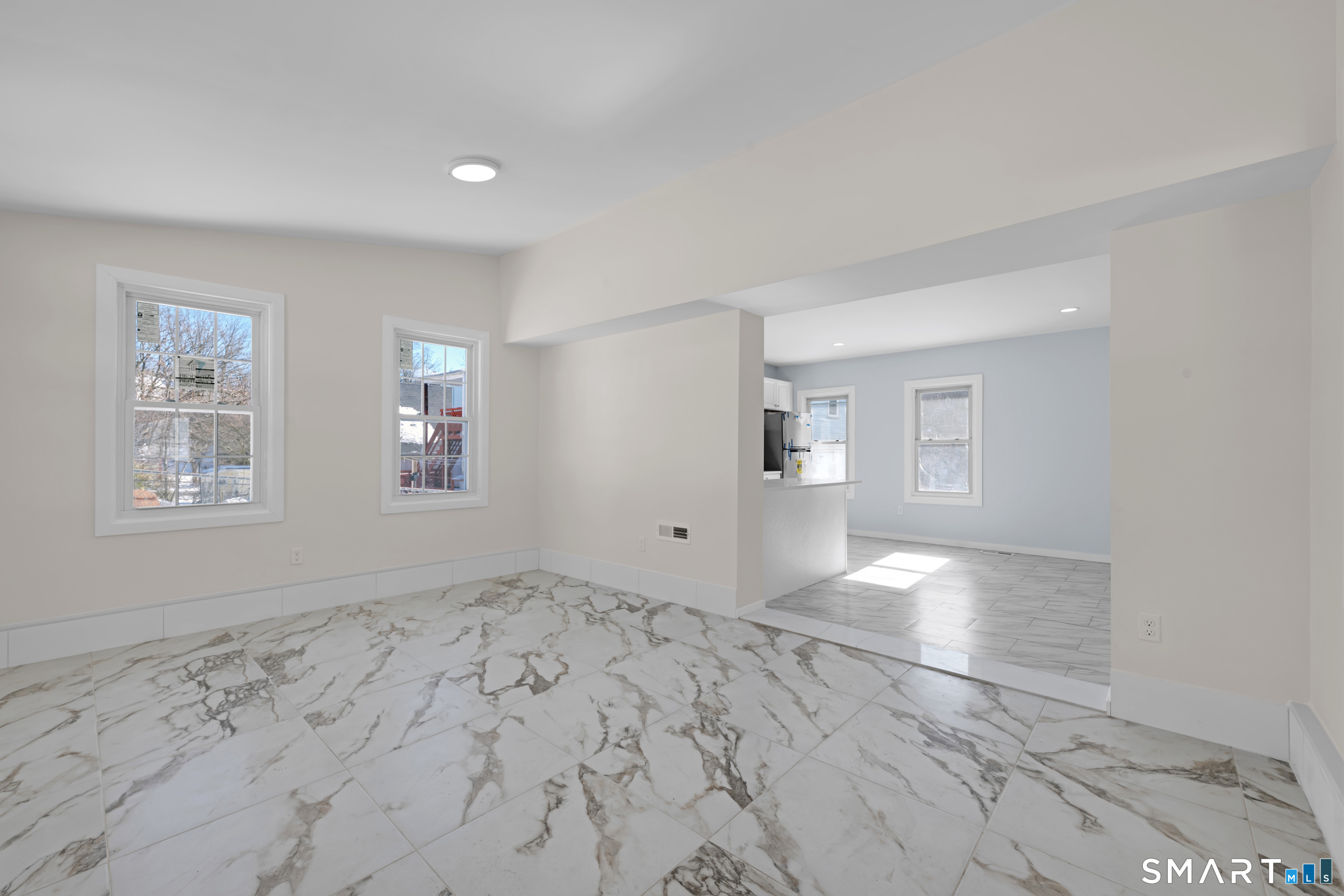 254 Broad Street Norwich, CT 06360 - Photo 2 of 38 a view of an empty room with a window