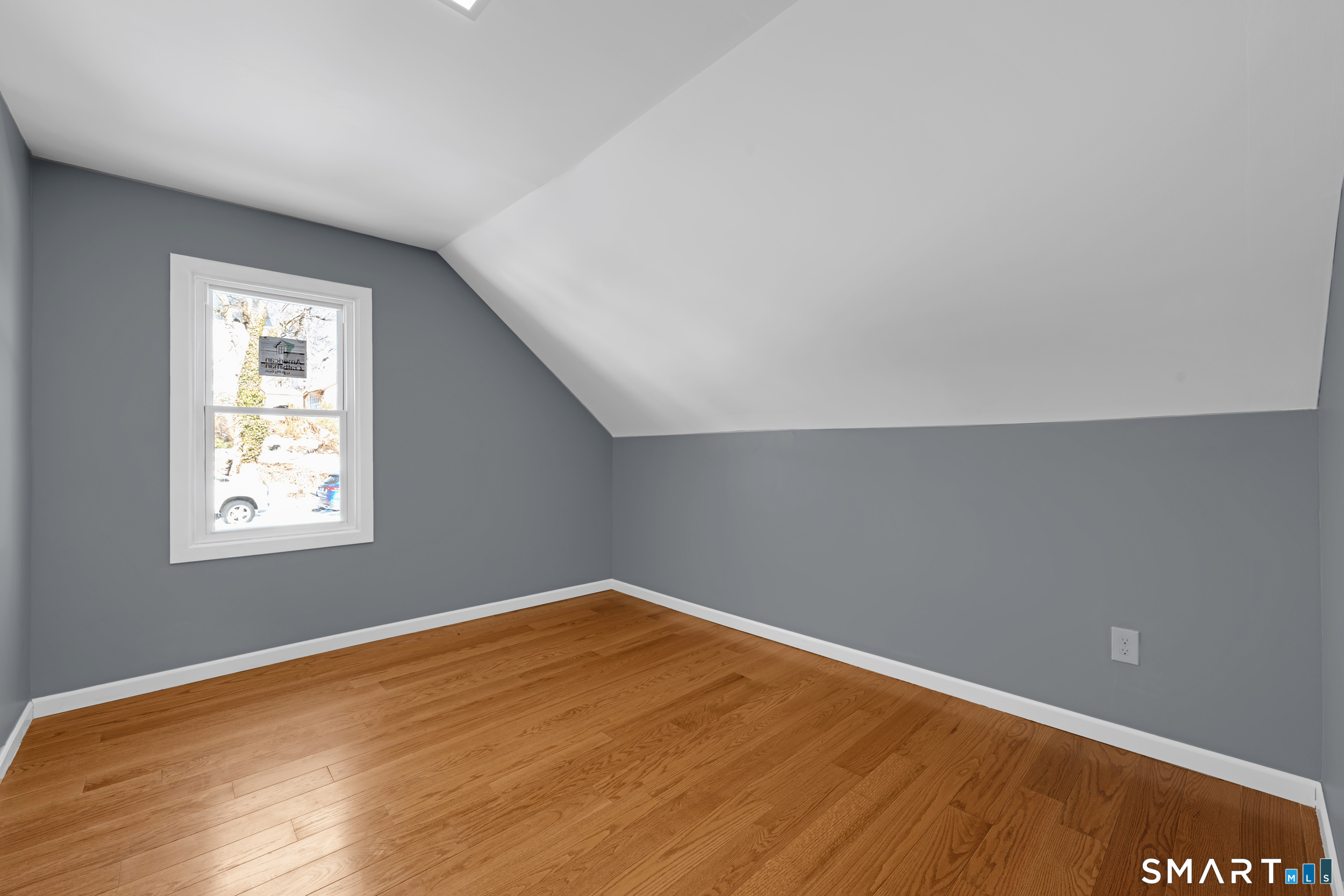 254 Broad Street Norwich, CT 06360 - Photo 21 of 38 an empty room with a window