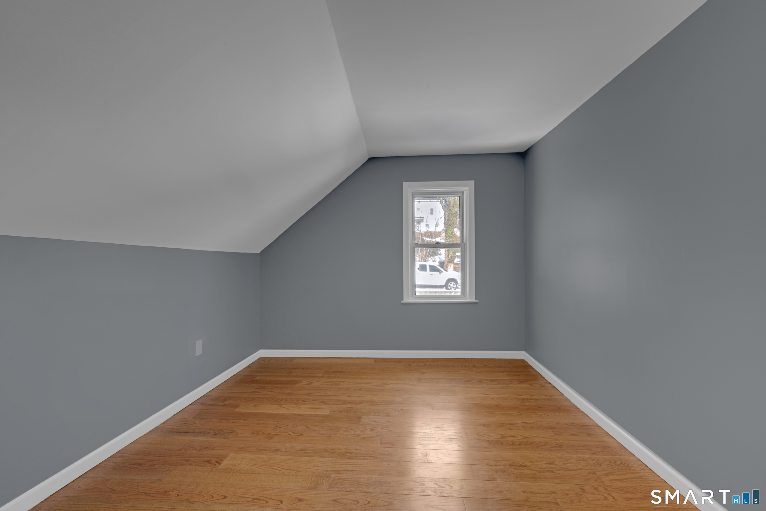 254 Broad Street Norwich, CT 06360 - Photo 24 of 38 wooden floor in an empty room with a window
