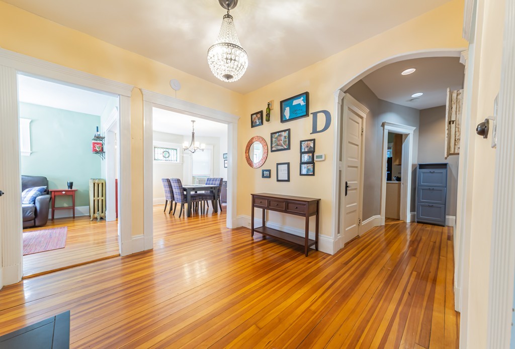 16 Parkton Road, Unit A Boston, MA 02130 - Photo 2 of 31 a view of a livingroom with furniture and wooden floor