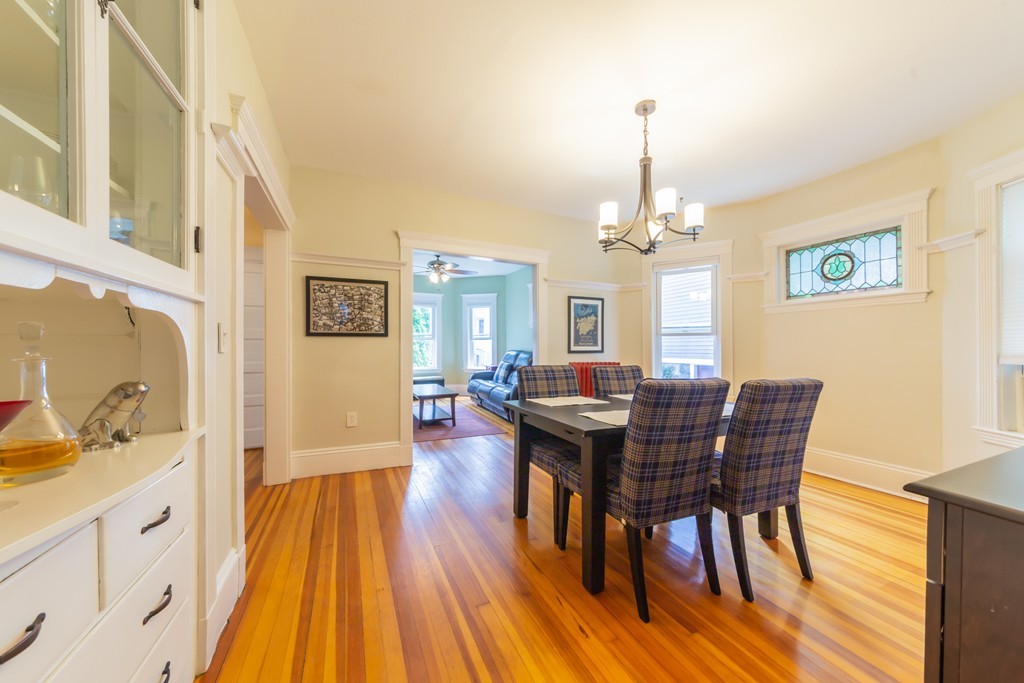 16 Parkton Road, Unit A Boston, MA 02130 - Photo 4 of 31 a view of a dining room with furniture window and wooden floor