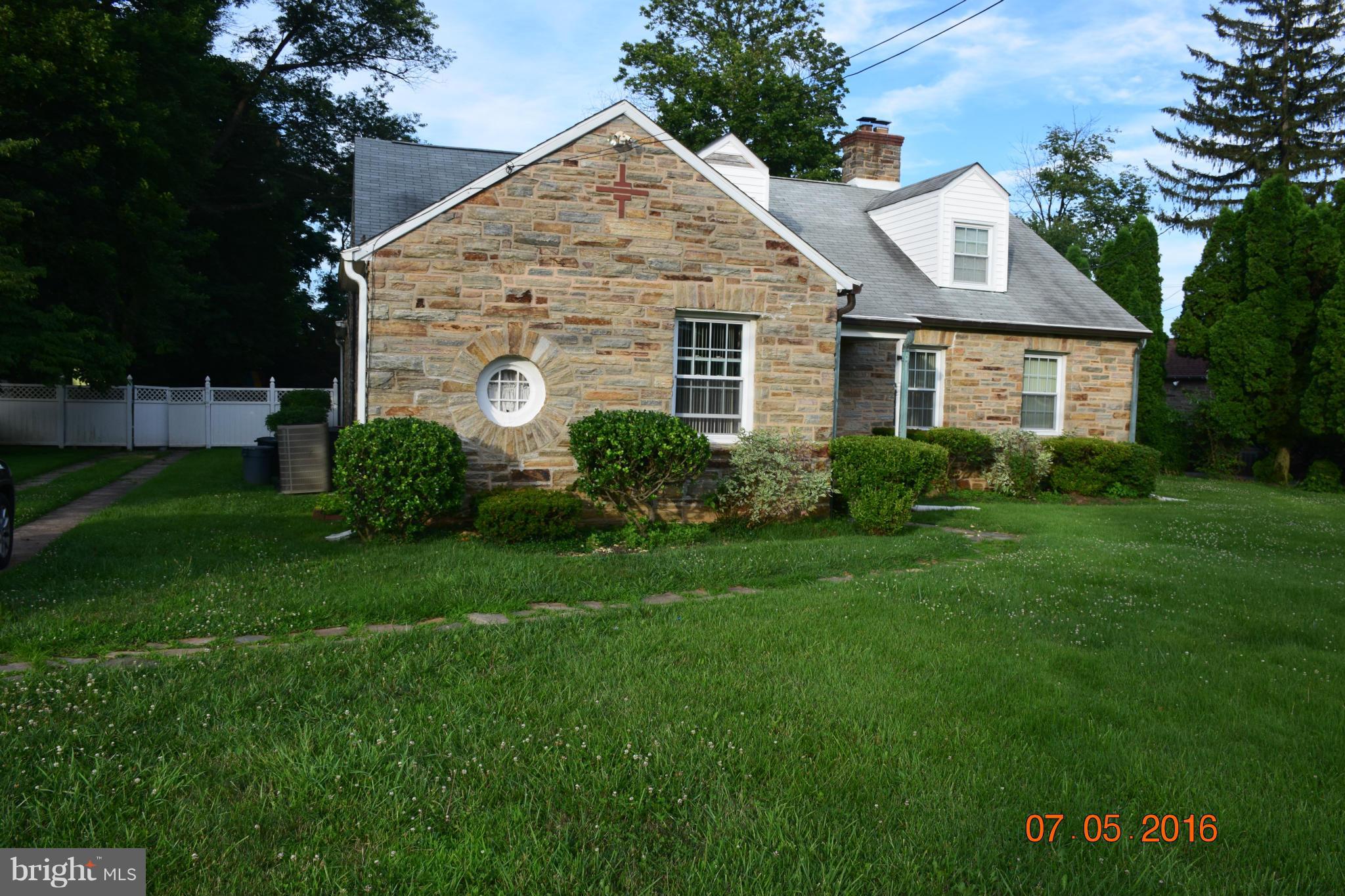 6810 Campfield Road Baltimore, MD 21207 - Photo 3 of 30 a view of a house with garden