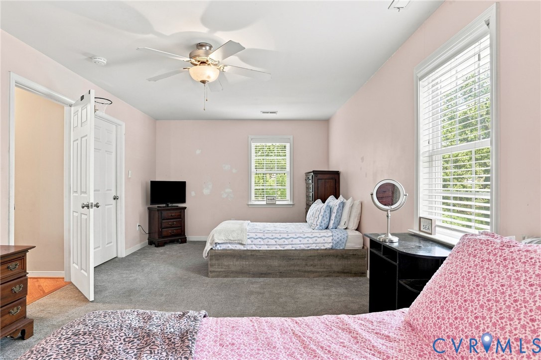6401 Poplar Road Quinton, VA 23141 - Photo 27 of 46 Carpeted room with a ceiling fan light fixture and