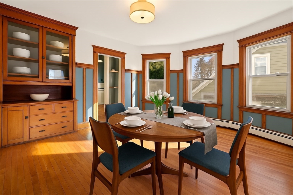 23 Brayton Road, Unit 23 Boston, MA 02135 - Photo 13 of 39 a view of a dining room with furniture and window
