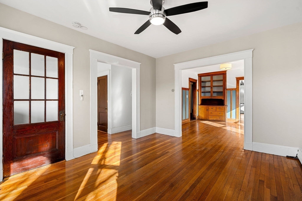 23 Brayton Road, Unit 23 Boston, MA 02135 - Photo 18 of 39 a view of empty room with wooden floor and fan
