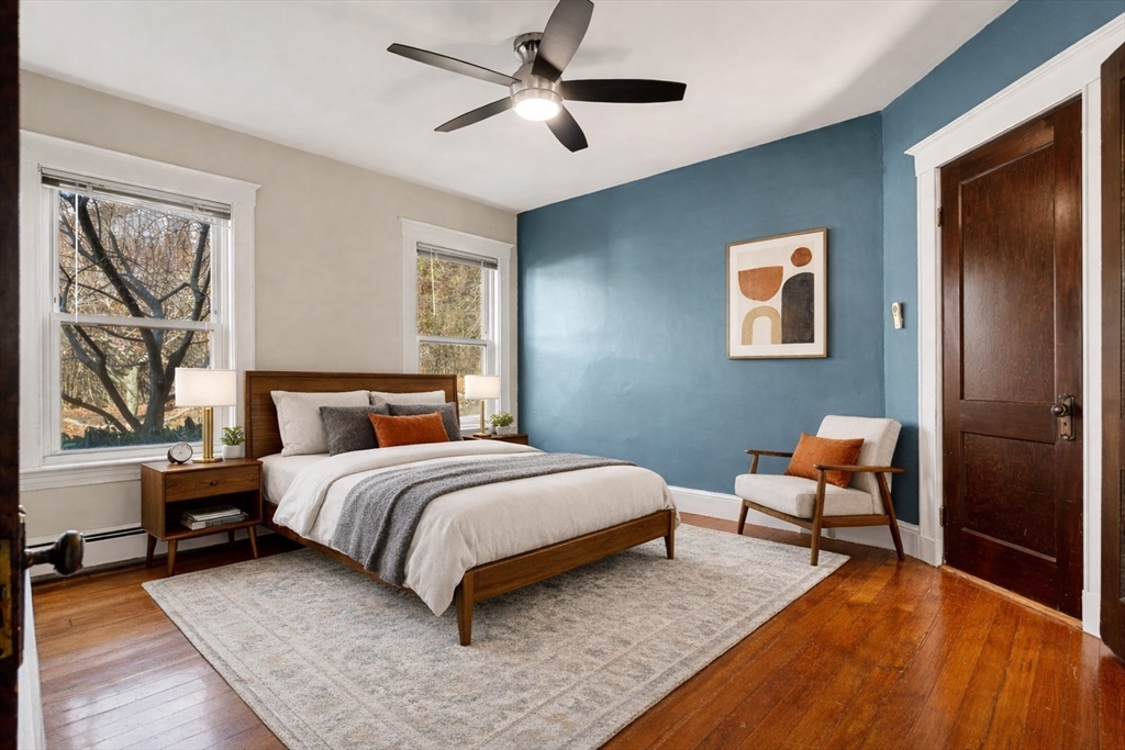 23 Brayton Road, Unit 23 Boston, MA 02135 - Photo 24 of 39 a bedroom with a bed and lamp