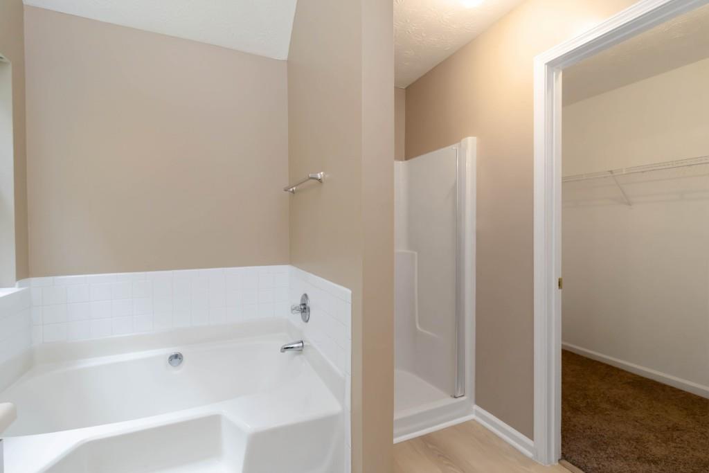 4783 Creekside Place Decatur, GA 30035 - Photo 19 of 24 a bathroom with a bathtub
