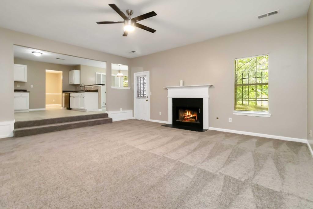4783 Creekside Place Decatur, GA 30035 - Photo 5 of 24 a view of an empty room with window and fireplace