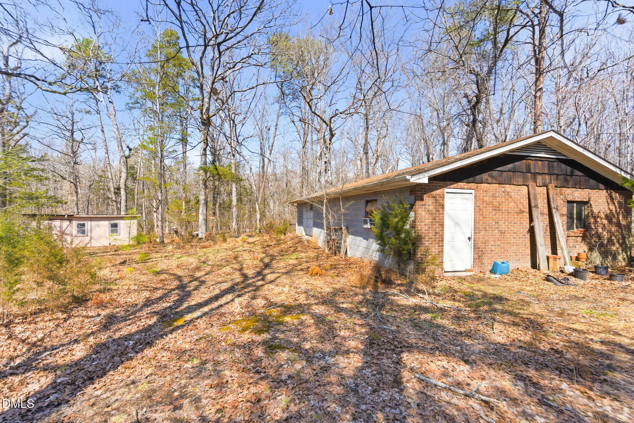 1603 Sykes Road Mebane, NC 27302 - Photo 38 of 45 a view of outdoor space with deck and tree