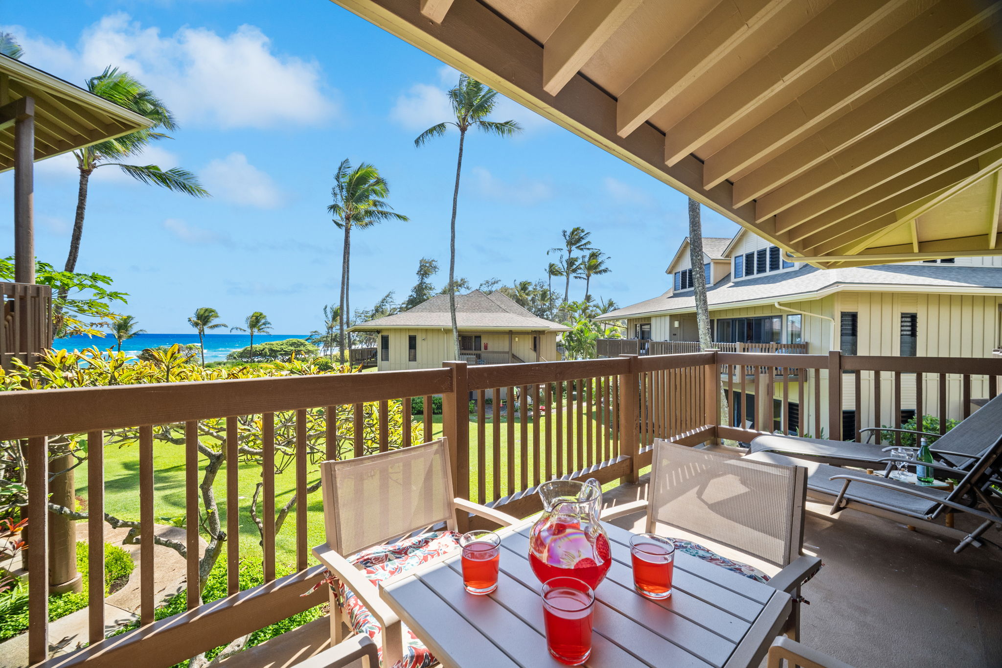 4460 Nehe Road, Unit 215 Lihue, HI 96766 - Photo 13 of 25 a view of a balcony with wooden floor
