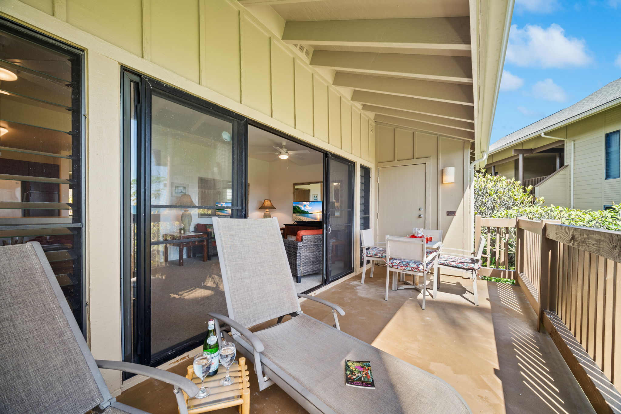 4460 Nehe Road, Unit 215 Lihue, HI 96766 - Photo 14 of 25 a living room with furniture and wooden floor