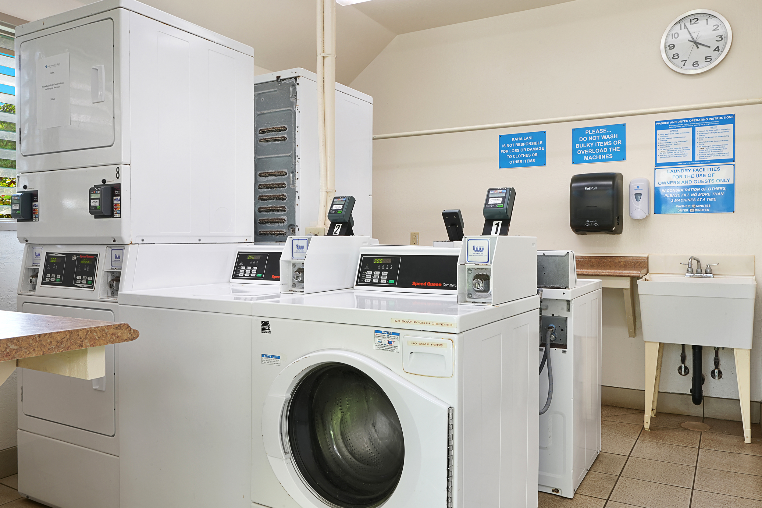 4460 Nehe Road, Unit 215 Lihue, HI 96766 - Photo 23 of 25 a view of kitchen sink and refrigerator