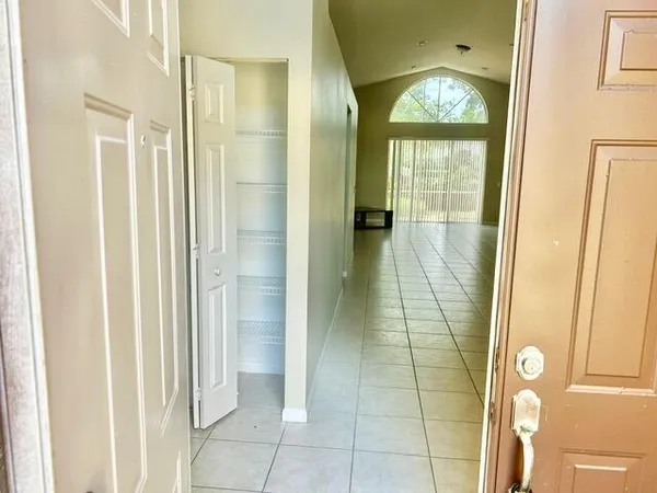 a bathroom with a glass door shower and a sink