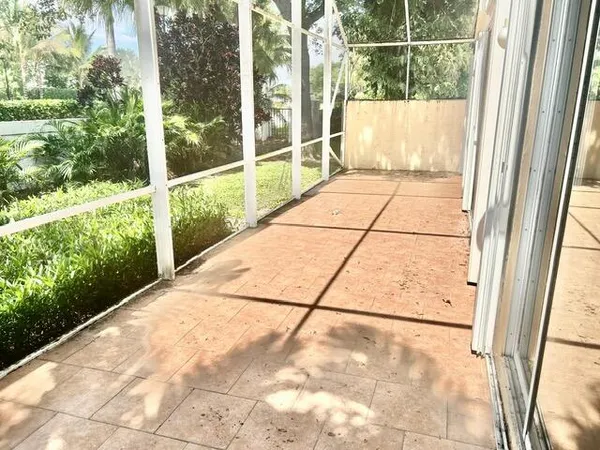 a view of balcony and yard