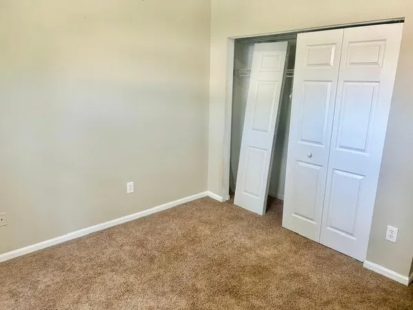 a bathroom with a toilet a sink and bathtub