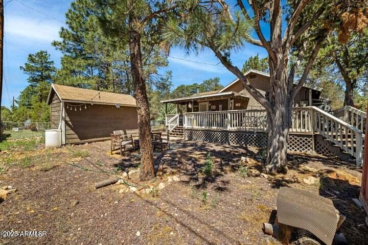 3355 Little Pine Drive Overgaard, AZ 85933 - Photo 2 of 26 a view of a house with a yard