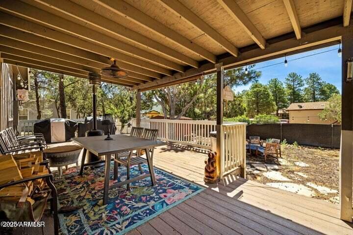 3355 Little Pine Drive Overgaard, AZ 85933 - Photo 23 of 26 a view of a patio with wooden floor