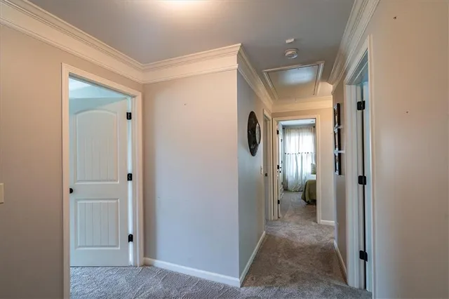 a bathroom with a granite countertop sink toilet and mirror