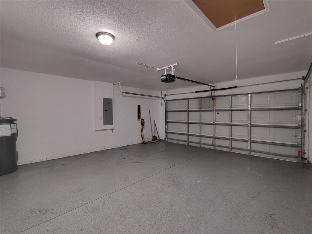 13093 Southwest 35th Circle Ocala, FL 34473 - Photo 12 of 15 a view of a garage