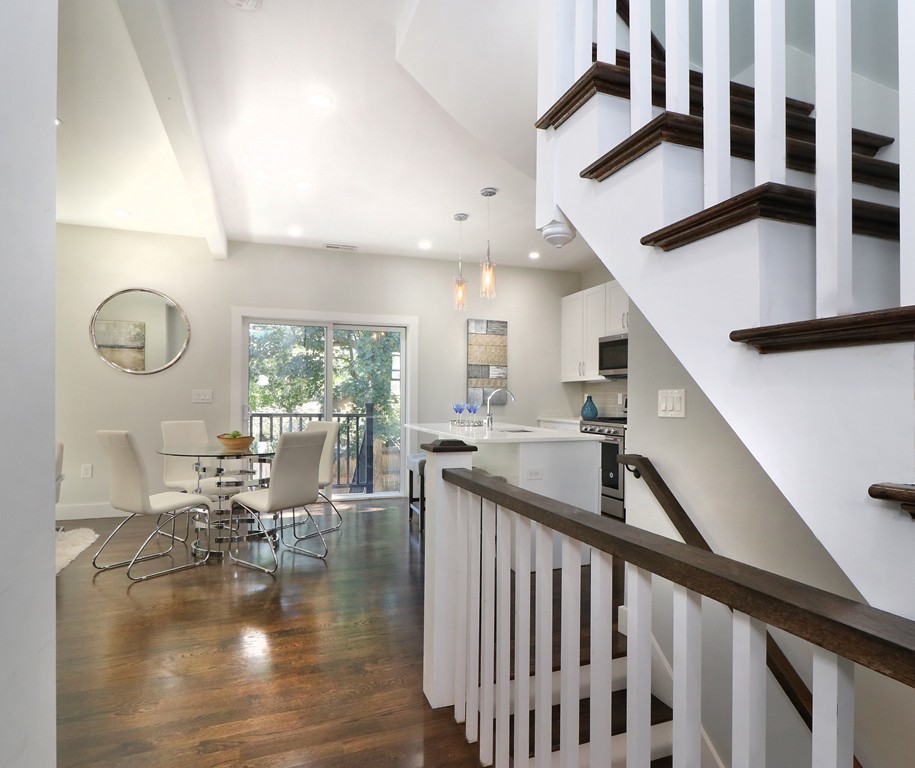 59 Mozart Street, Unit 2 Boston, MA 02130 - Photo 18 of 21 a view of living room with furniture and staircase