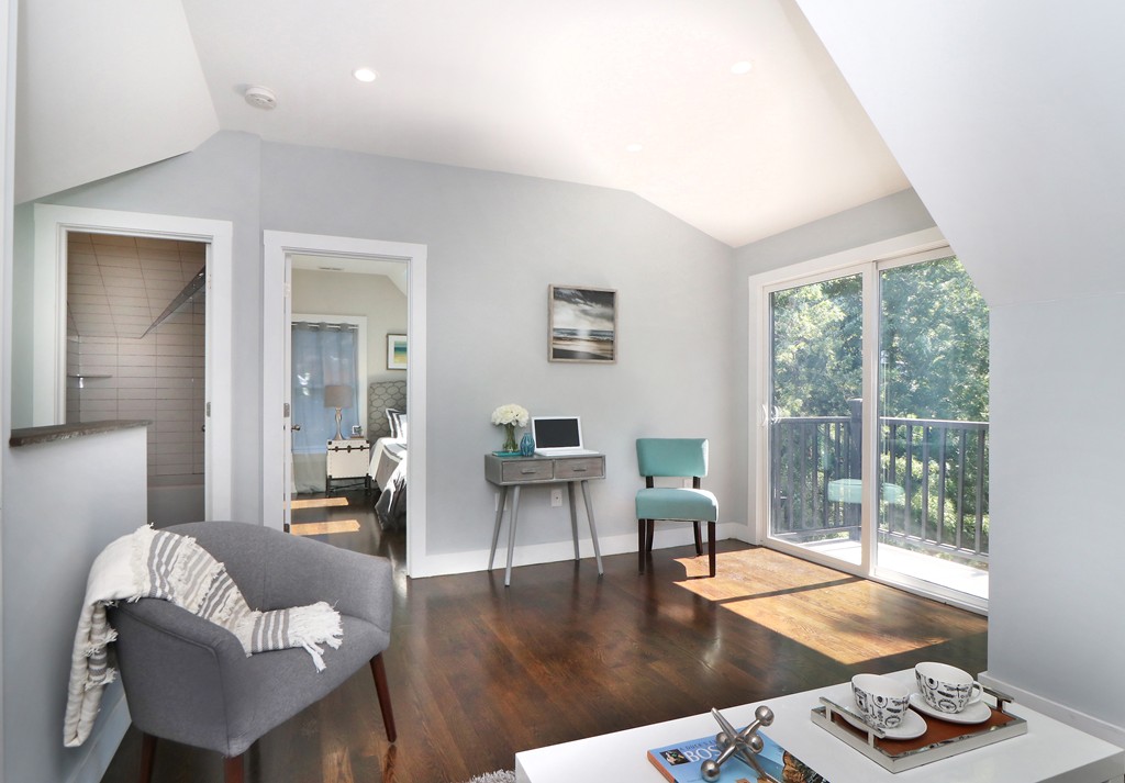 59 Mozart Street, Unit 2 Boston, MA 02130 - Photo 21 of 21 a living room with furniture and a wooden floor