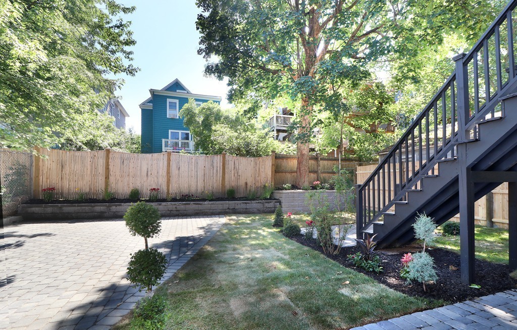 59 Mozart Street, Unit 2 Boston, MA 02130 - Photo 8 of 21 a view of garden with wooden stairs