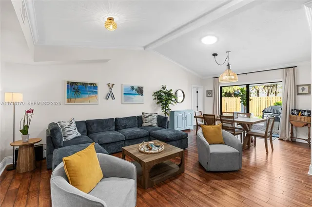 swimming pool view with a seating space