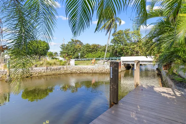 a view of a swimming pool with a lake view