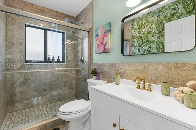 a kitchen with a sink stove and microwave