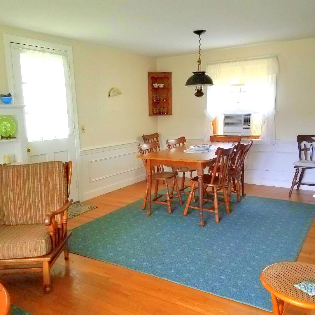 15 Osborne Road Harwich, MA 02671 - Photo 8 of 32 a dining room with furniture and window