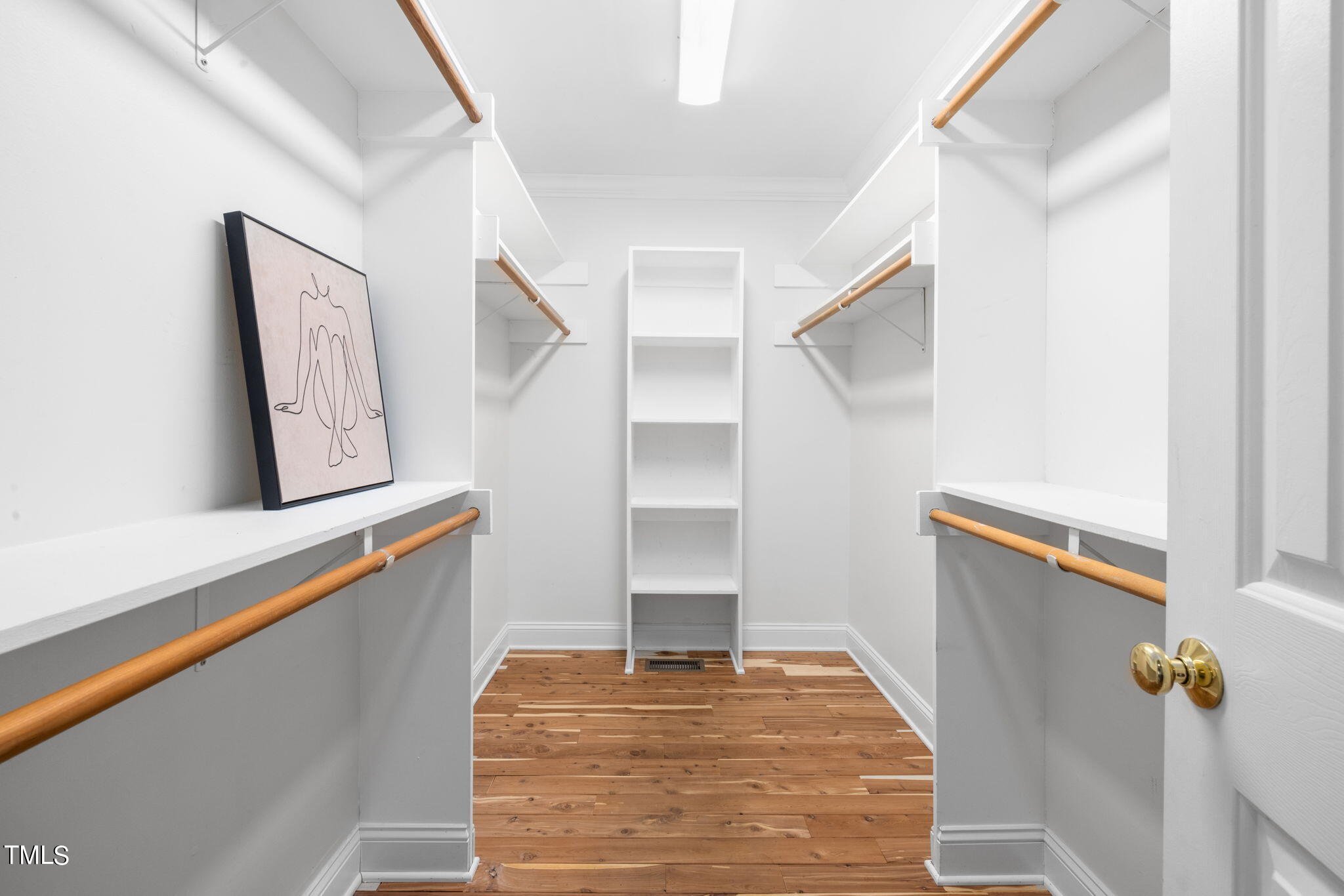 8673 Harps Mill Road Raleigh, NC 27615 - Photo 25 of 38 a view of a hallway with staircase