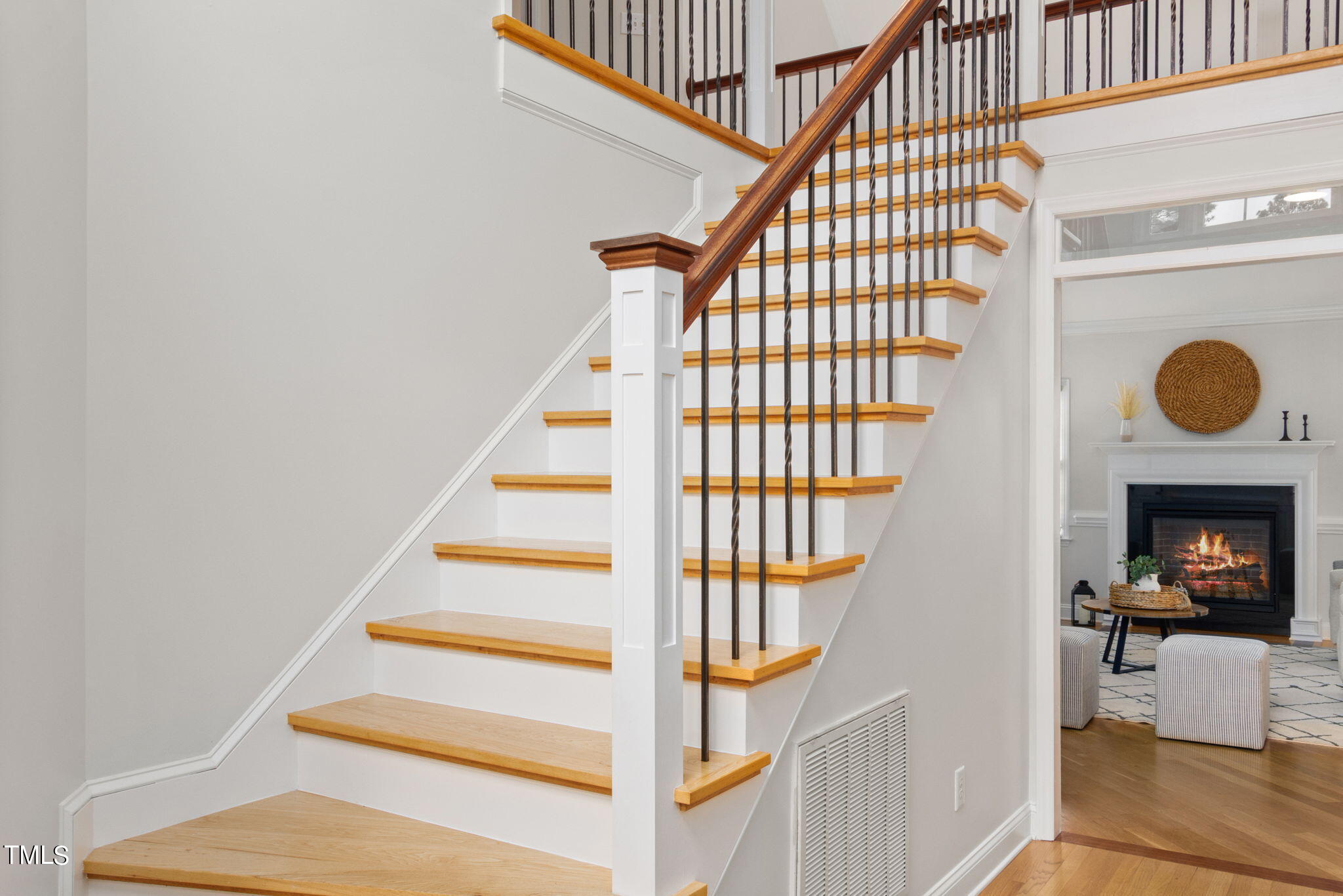 8673 Harps Mill Road Raleigh, NC 27615 - Photo 3 of 38 a view of entryway and hall with wooden floor