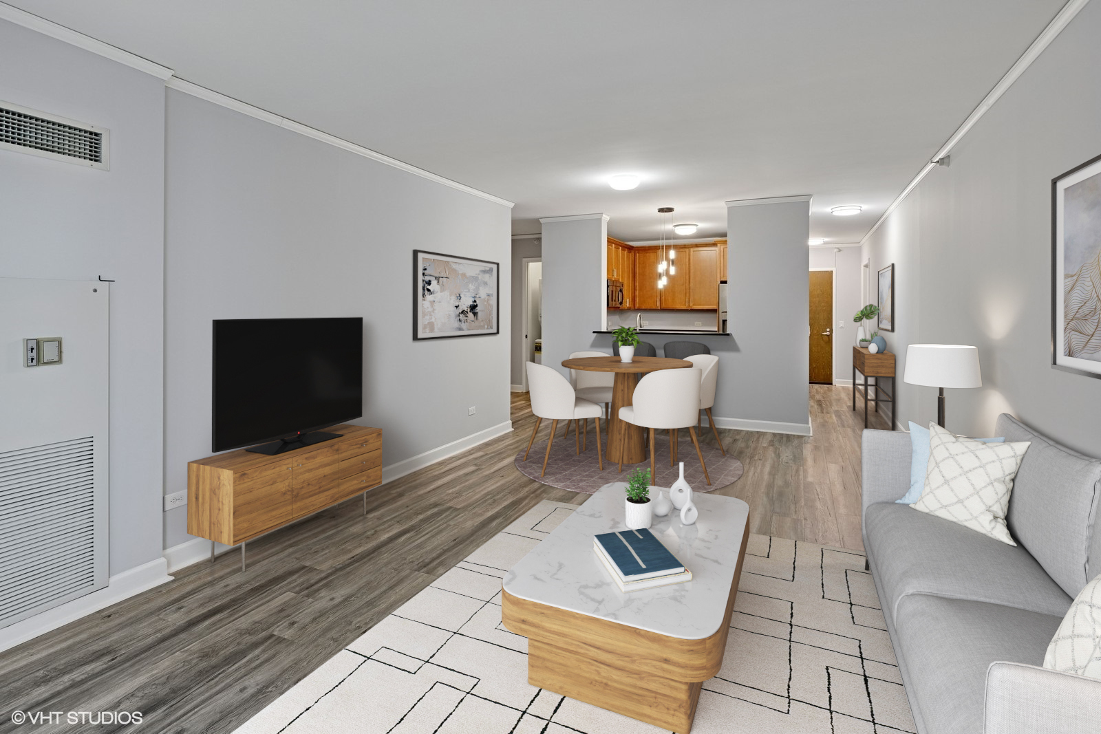 450 East Waterside Drive, Unit 505 Chicago, IL 60601 - Photo 11 of 32 a living room with furniture and a flat screen tv