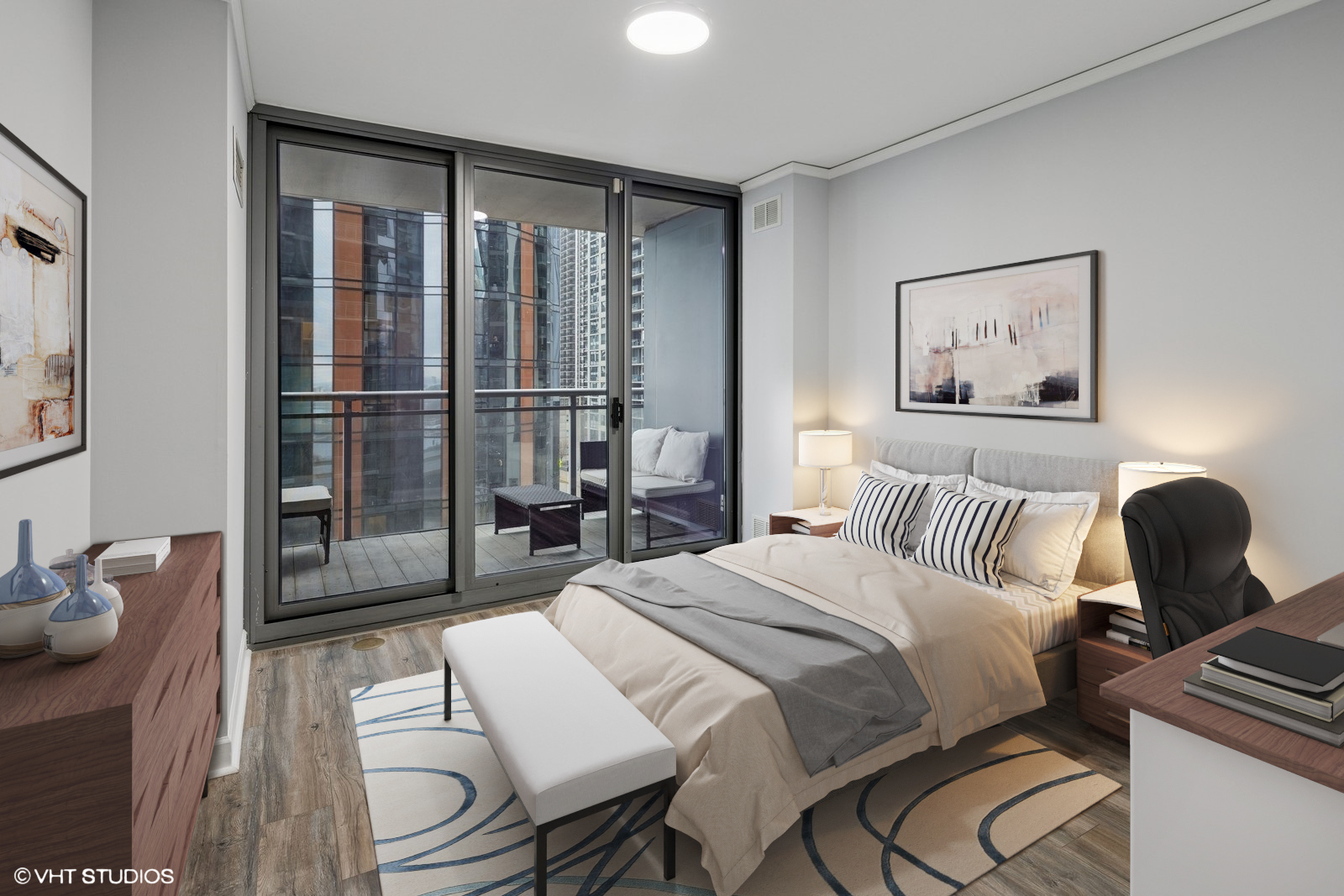 450 East Waterside Drive, Unit 505 Chicago, IL 60601 - Photo 20 of 32 a bedroom with a bed and wooden floor