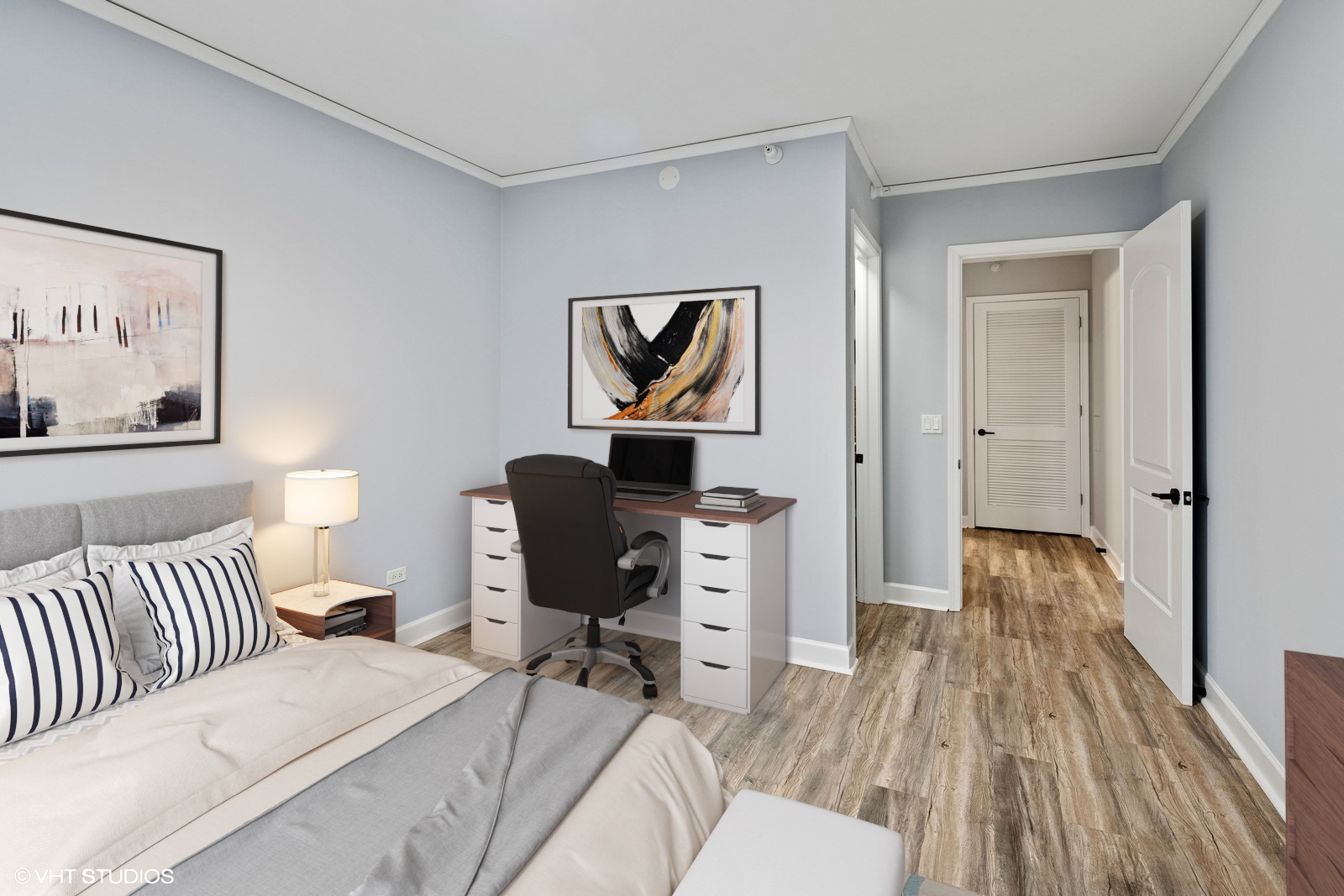 450 East Waterside Drive, Unit 505 Chicago, IL 60601 - Photo 22 of 32 a bedroom with a bed and a painting on the wall