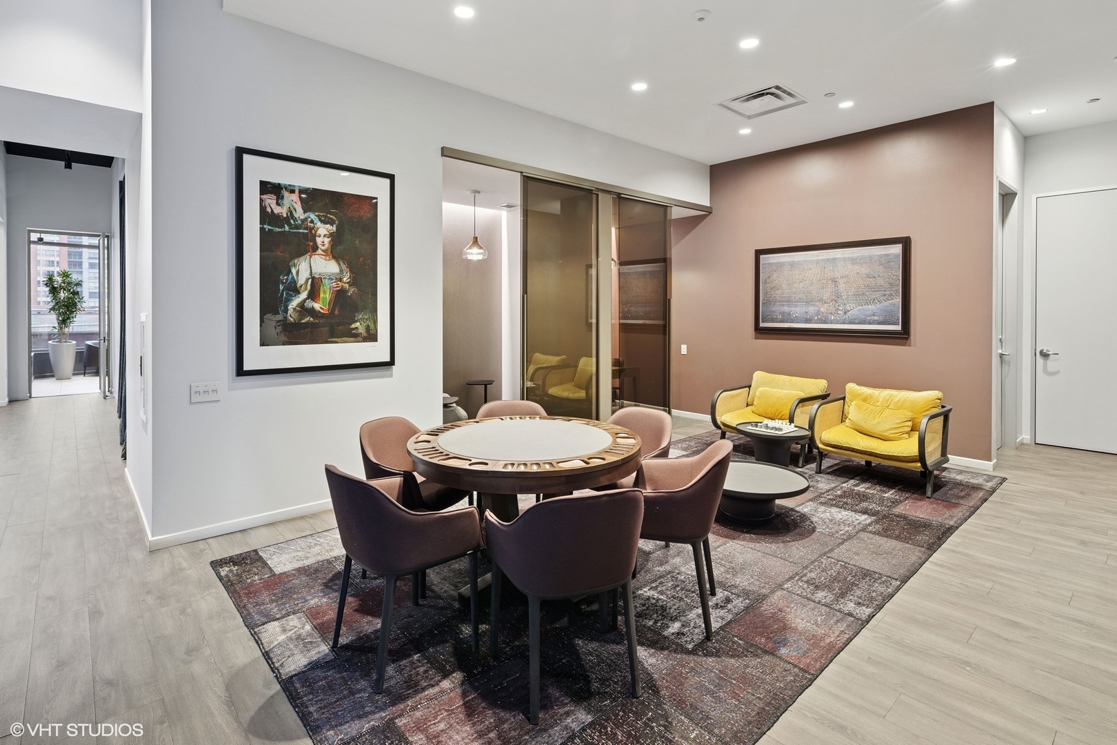 450 East Waterside Drive, Unit 505 Chicago, IL 60601 - Photo 31 of 32 a view of a dining room with furniture window and wooden floor