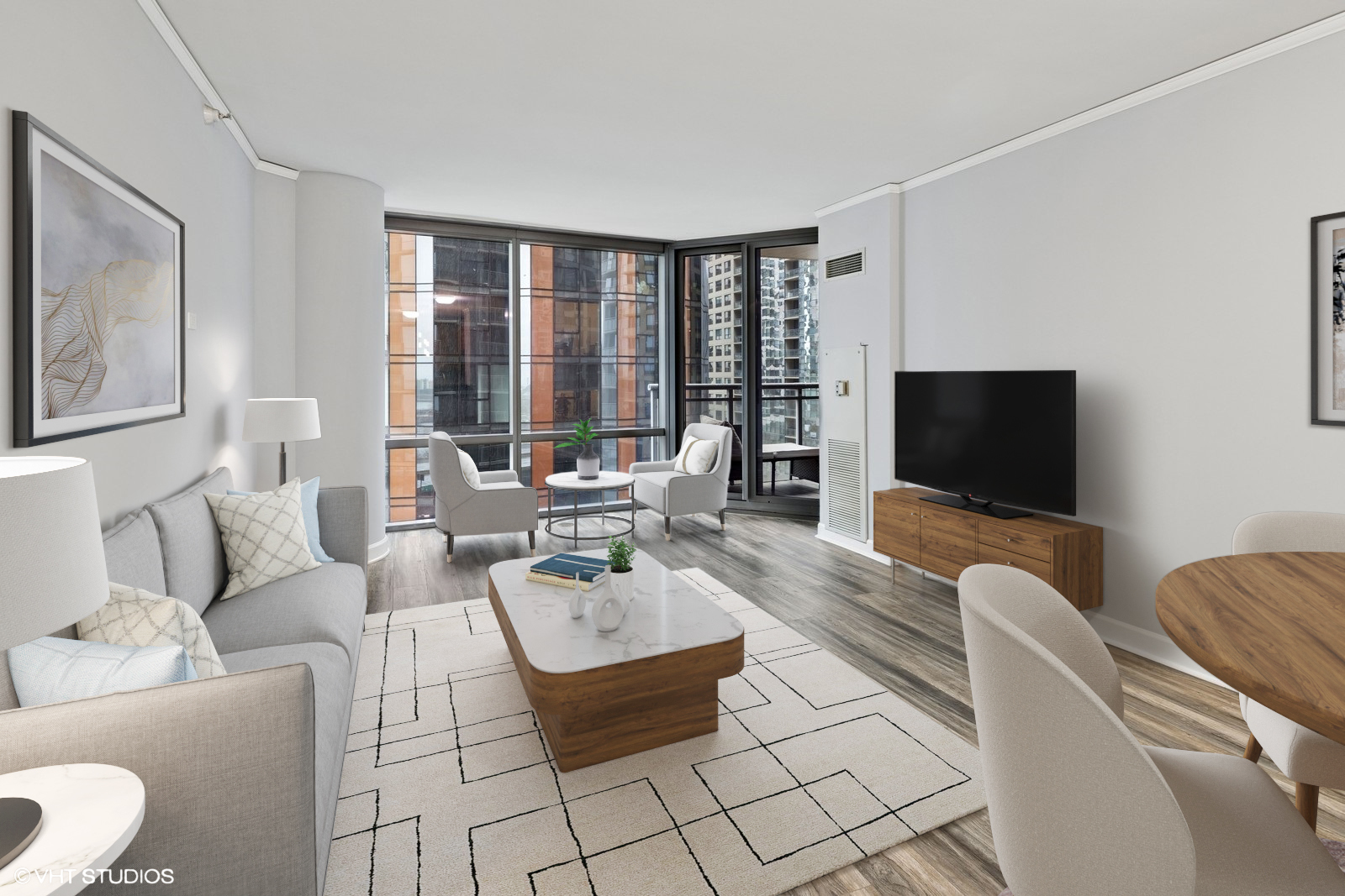 450 East Waterside Drive, Unit 505 Chicago, IL 60601 - Photo 6 of 32 a living room with furniture and a flat screen tv