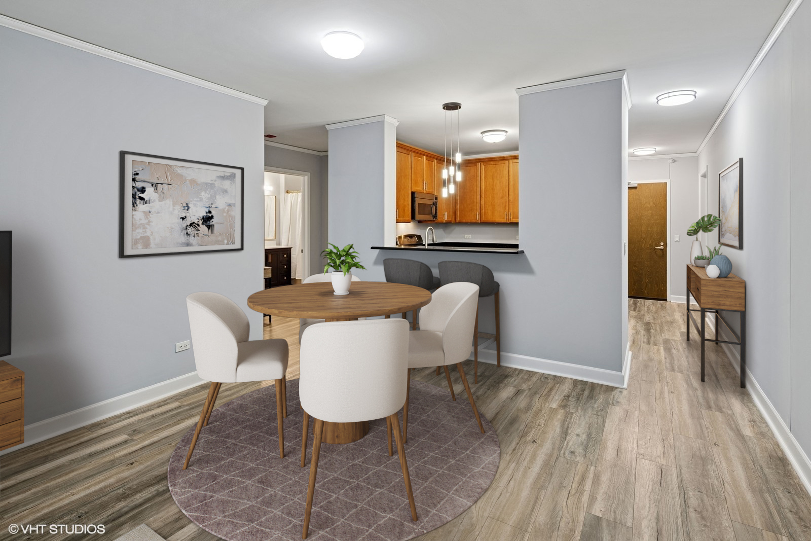 450 East Waterside Drive, Unit 505 Chicago, IL 60601 - Photo 9 of 32 a view of a dining room with furniture window and wooden floor