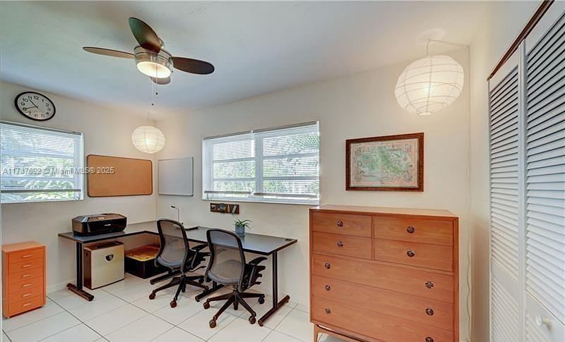 1180 Southwest 4th Terrace Pompano Beach, FL 33060 - Photo 5 of 8 a work room with furniture and a window