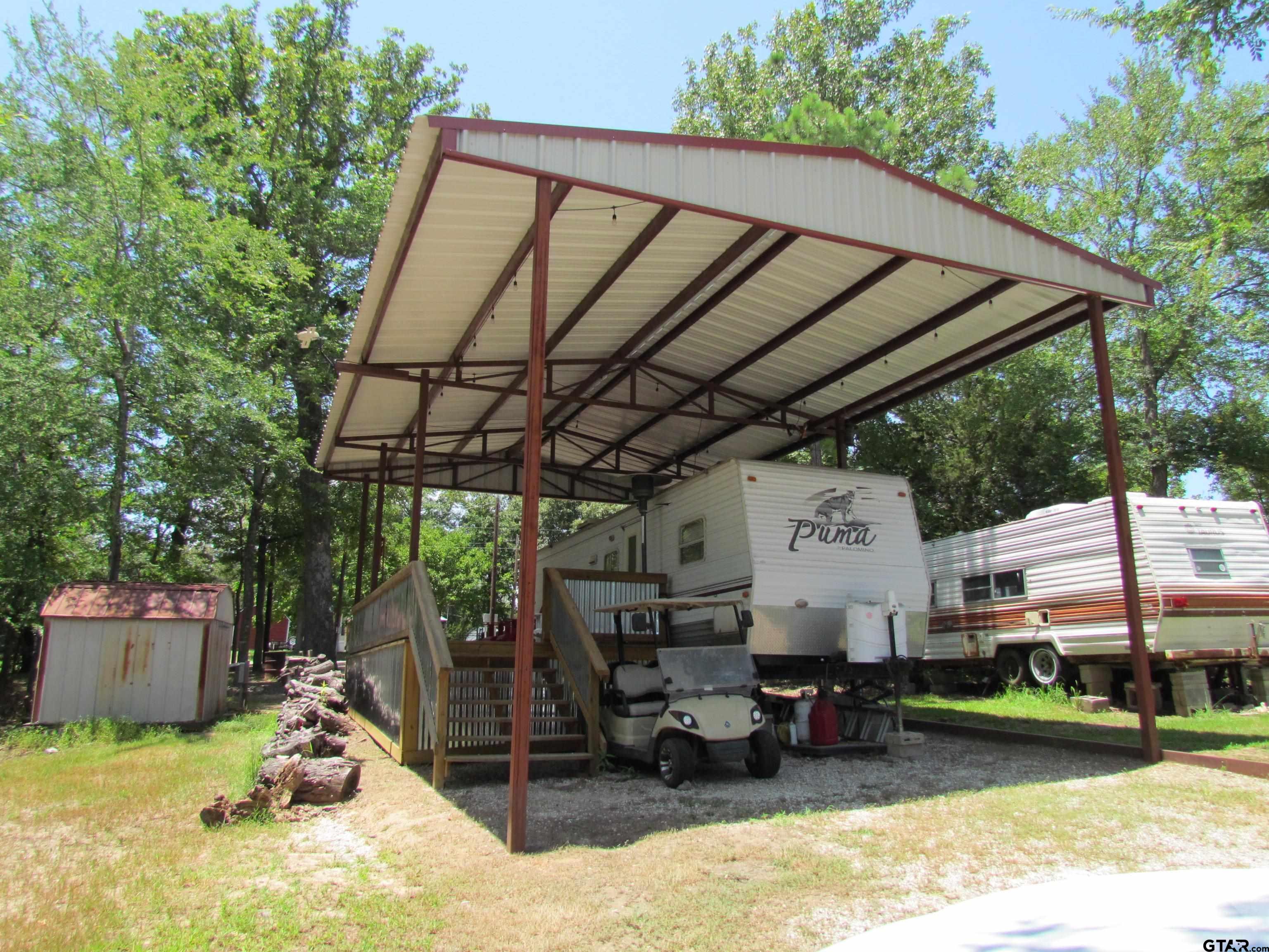 a view of yard with table and chairs