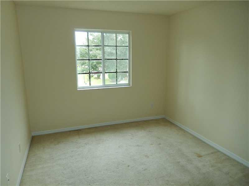 10323 Southwest 24th Street Miramar, FL 33025 - Photo 17 of 21 an empty room with a window