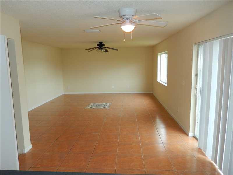 10323 Southwest 24th Street Miramar, FL 33025 - Photo 5 of 21 a view of empty room with windows