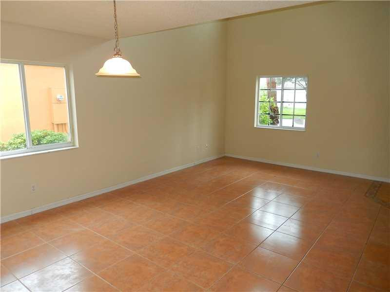 10323 Southwest 24th Street Miramar, FL 33025 - Photo 7 of 21 a view of an empty room with a window
