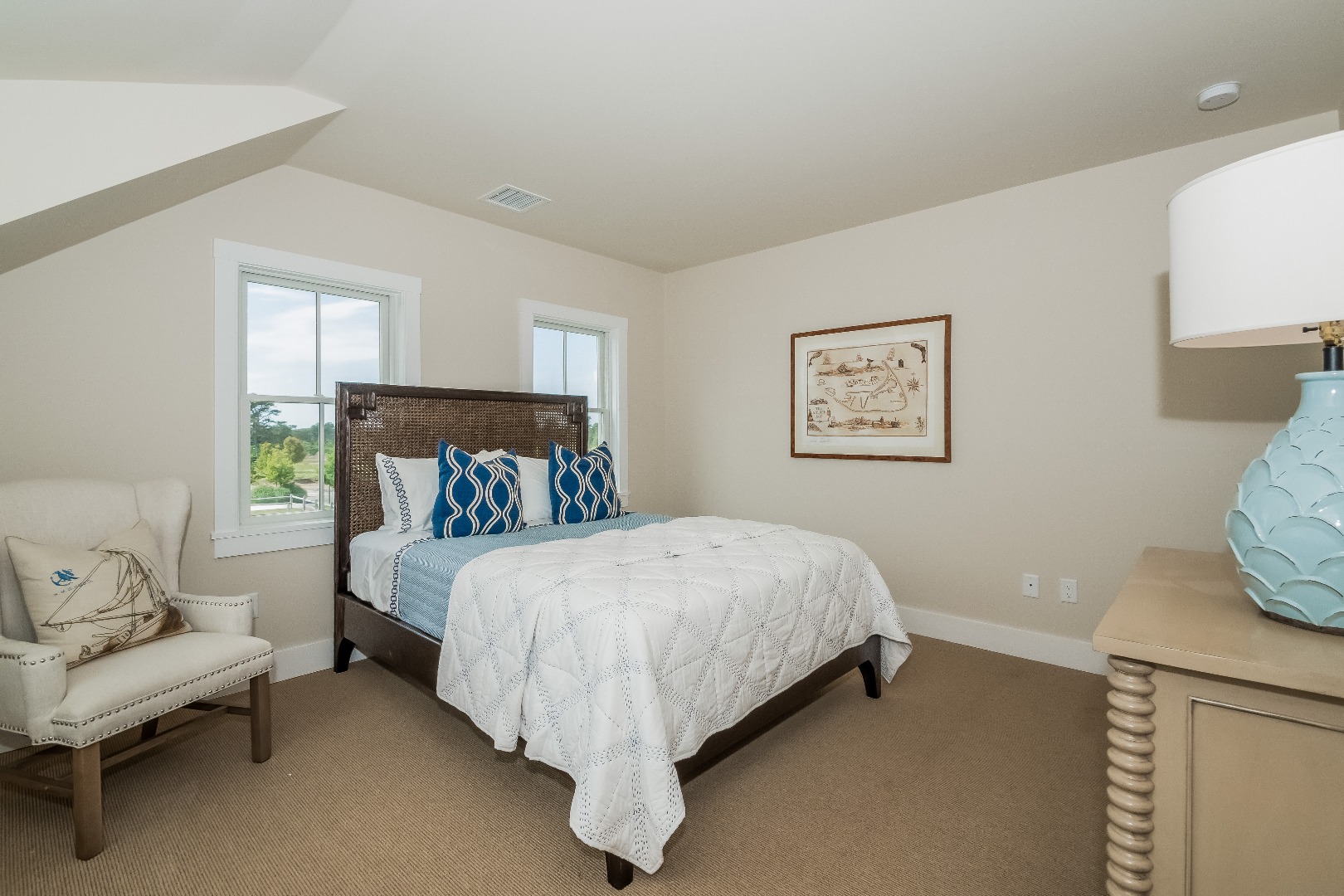16 Blazing Star Road Nantucket, MA 02554 - Photo 21 of 35 a bed sitting in a spacious bedroom next to a window