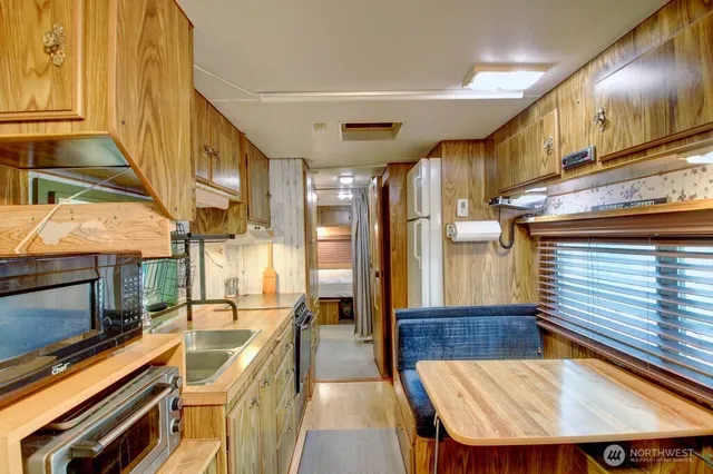 a view of a living room with furniture