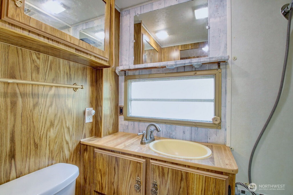 3-2 Wilderness Way Maple Falls, WA 98266 - Photo 17 of 39 a bathroom with a sink and a mirror