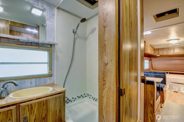 a bathroom with a sink and mirror