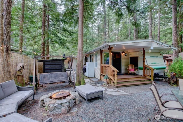 a view of a couches in patio of a house