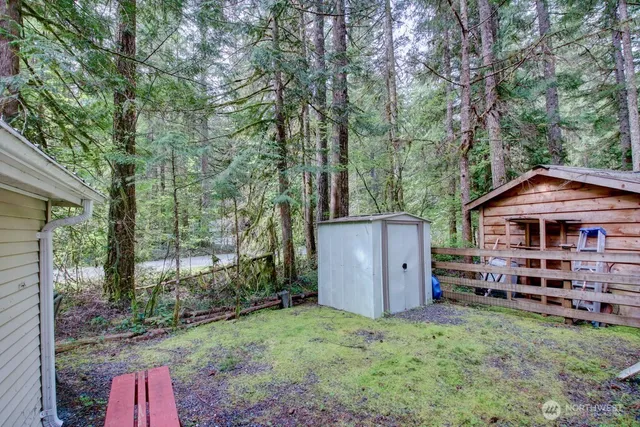 a backyard of a house with lots of green space