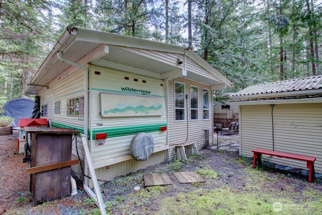 3-2 Wilderness Way Maple Falls, WA 98266 - Photo 23 of 39 a front view of a house with garden